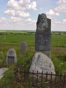 At the Jewish cemetery in Byhov.