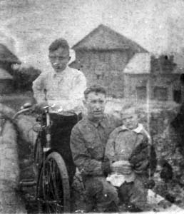 Lev Manevich, his younger brother and father.